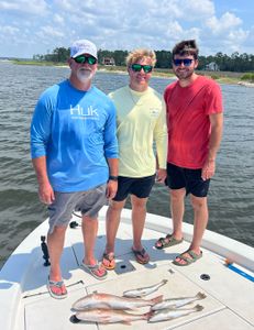 Three people fishing in Milton