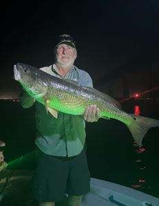 Angler with a big catch in Milton