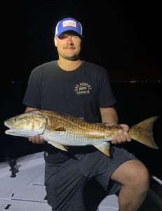 A lone angler fishing in FL with a big 22-inch catch