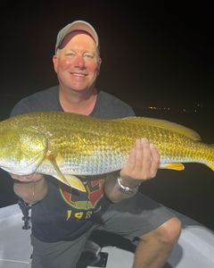 Successful angler with a 23-inch catch in Milton