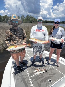 Double redfish delight in Milton's clearing skies!