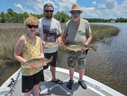 Redfish double-header in Milton's clear waters!