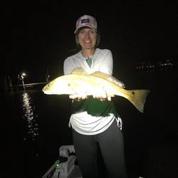 Huge redfish hooked on a cloudy day in Milton!