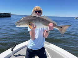 Reeling in a good catch on the open waters.