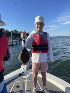 Nice Southern flounder using jigging and fly fishing techniques in clear conditions!