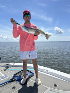 Big Spotted Weakfish reeled in on a clear day in Milton!