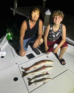 2 people fishing in Milton