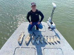 Angler with a black drum fish, caught in TX
