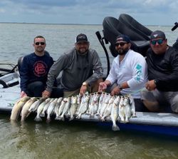 Group of people fishing in TX