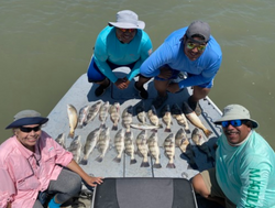 Group of 5 people fishing in TX