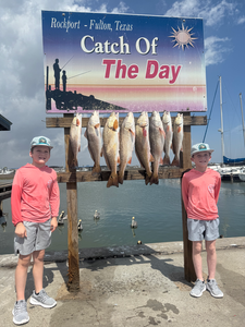 Six Port Aransas redfish making for great fishing memories!