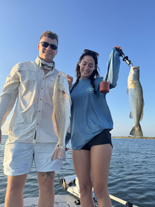 Nice redfish and speckled trout using jigging and trolling techniques today!