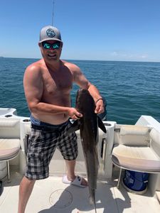 A fisherman enjoying a day of fishing in Virginia Beach