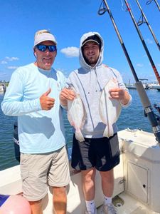 Two anglers fishing at Barnegat Light