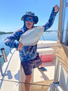 One fisherman with a 12-inch catch at Barnegat Light