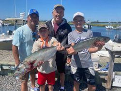 4 people fishing in NJ