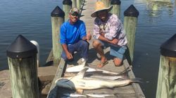 Two people enjoying fishing in VA