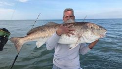 A lone fisherman casts a line in Virginia