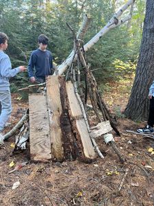 Creative forest shelter building.