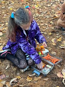 Focused camp activity.