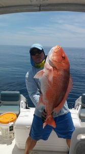 Angler with big 27-inch fish on fishing tour in Sarasota