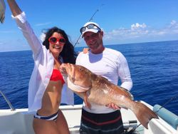 Two people fishing on the water in Sarasota