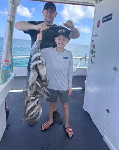 Two people enjoying a fishing trip at St. Pete Beach
