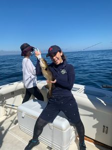 Two people fishing in MA