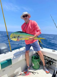 Angler fishing in FL with large 18-inch catch