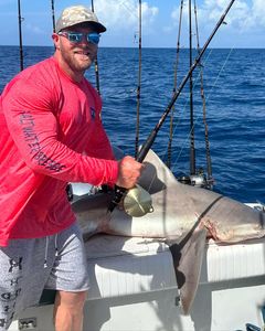 A person cruises and fishes at New Smyrna Beach