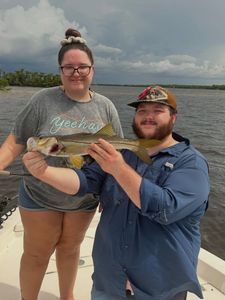 2 people fishing for snook in FL