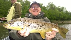 Angler holding a beautiful sea trout catch in Keystone
