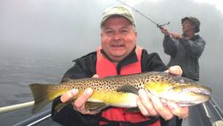 Anglers with a big fish in AR