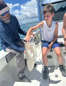 Angler catching a fish in New Smyrna Beach