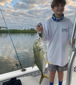 A person enjoying a fishing cruise in New Smyrna Beach