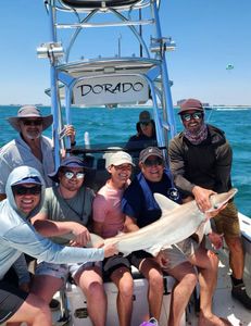 Seven people fishing on a boat in Florida