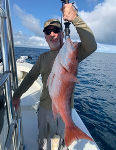 A lone angler fishing in the waters of FL