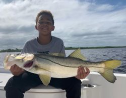 A snook fish caught in FL during a cruises and fishing adventure