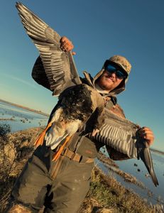 Angler enjoying a fishing trip in Arbuckle