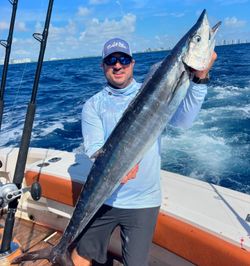 Fisherman with a large 40-inch catch in FL
