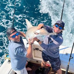 A group of 3 people fishing in FL