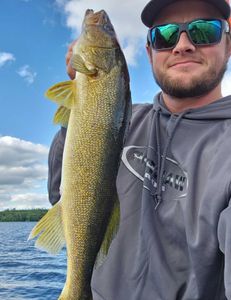 A fisherman reeling in a catch in Minnesota