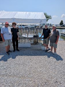 Four people fishing at Port Clinton