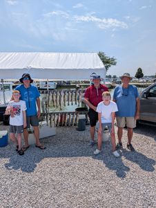 Group of 5 people fishing at Port Clinton
