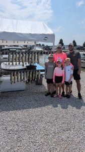 5 people fishing in Port Clinton