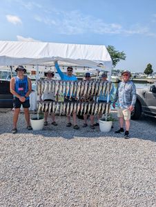 6 people fishing in Port Clinton