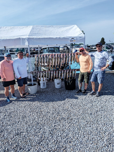 Four people fishing in Port Clinton