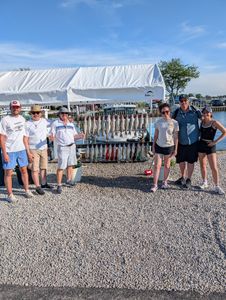 Group of 6 people fishing at Port Clinton