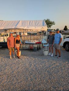 Three people fishing in Port Clinton