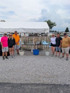 Group of 6 people fishing in Port Clinton